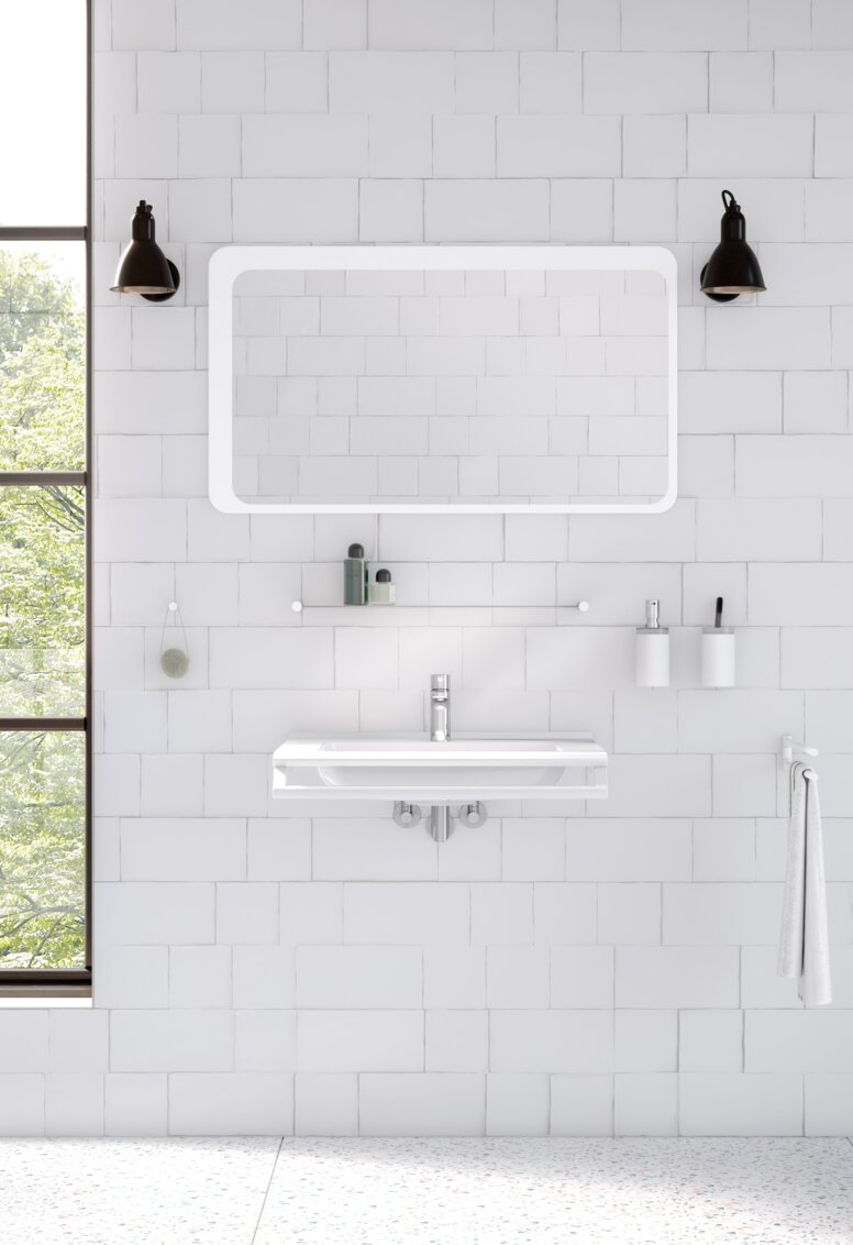 Modern washbasin situation with white matt sanitary accessories such as soap dispenser, towel rail and shelf